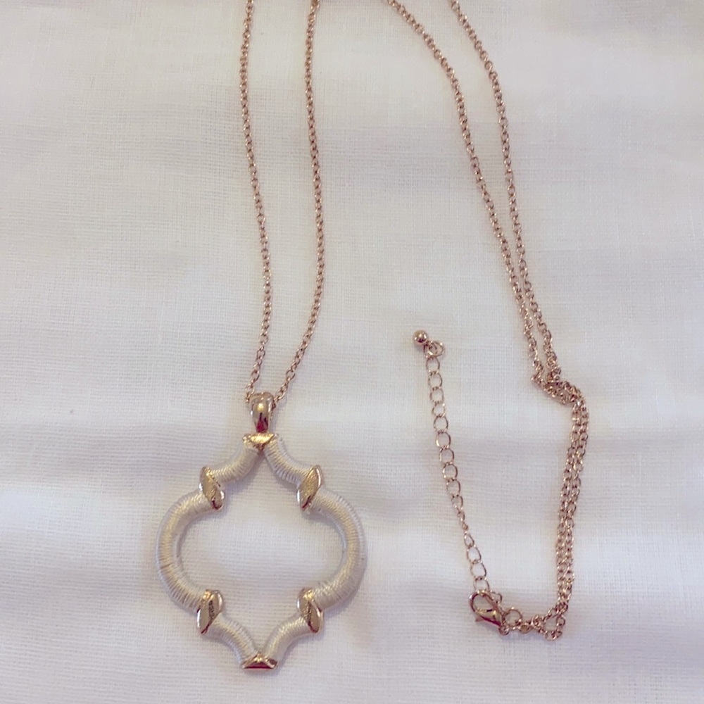 Gold tone and white necklace